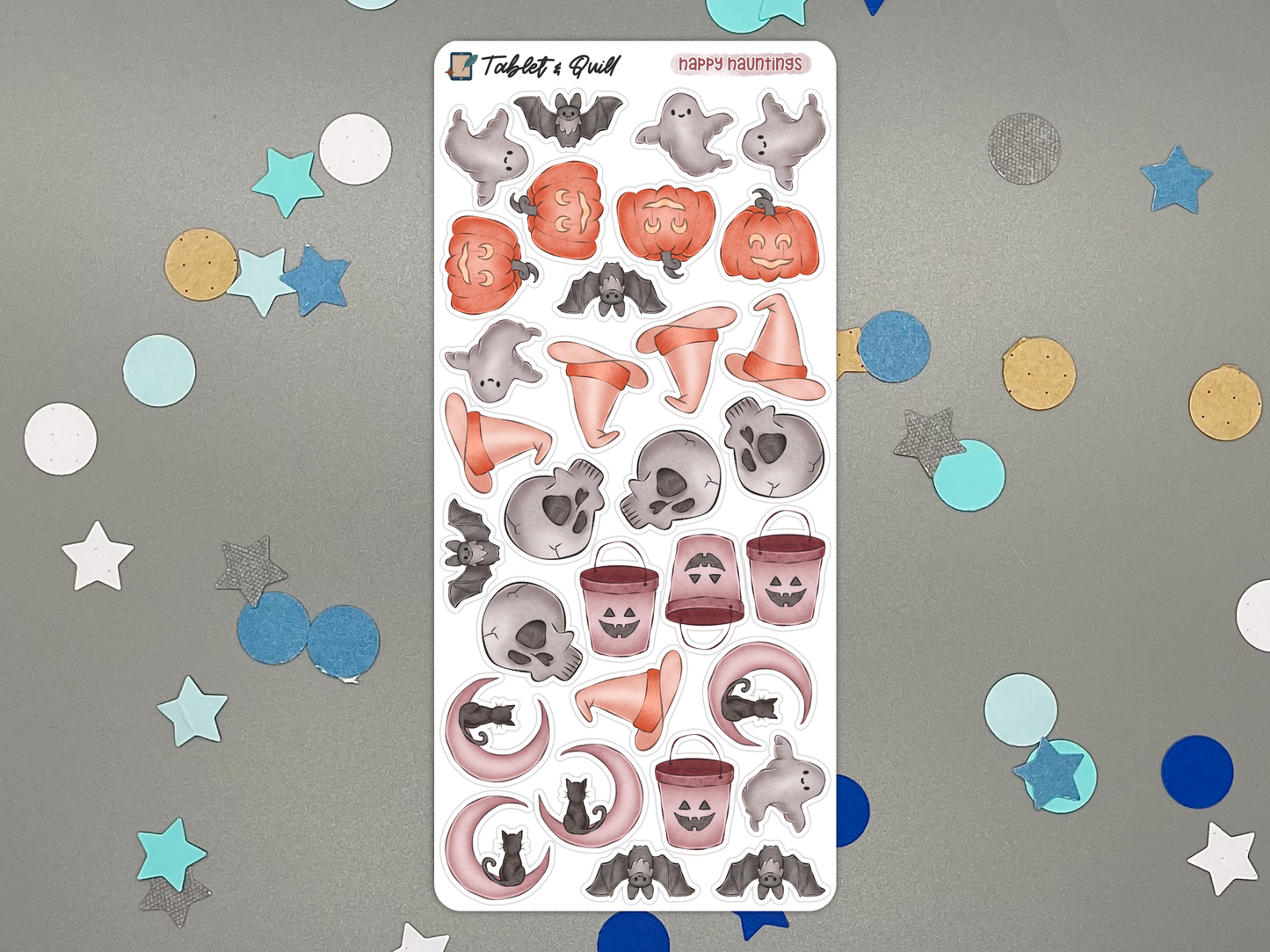 Sheet of Halloween-themed stickers with confetti on a gray background
