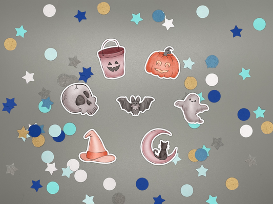 Halloween-themed stickers on a gray background