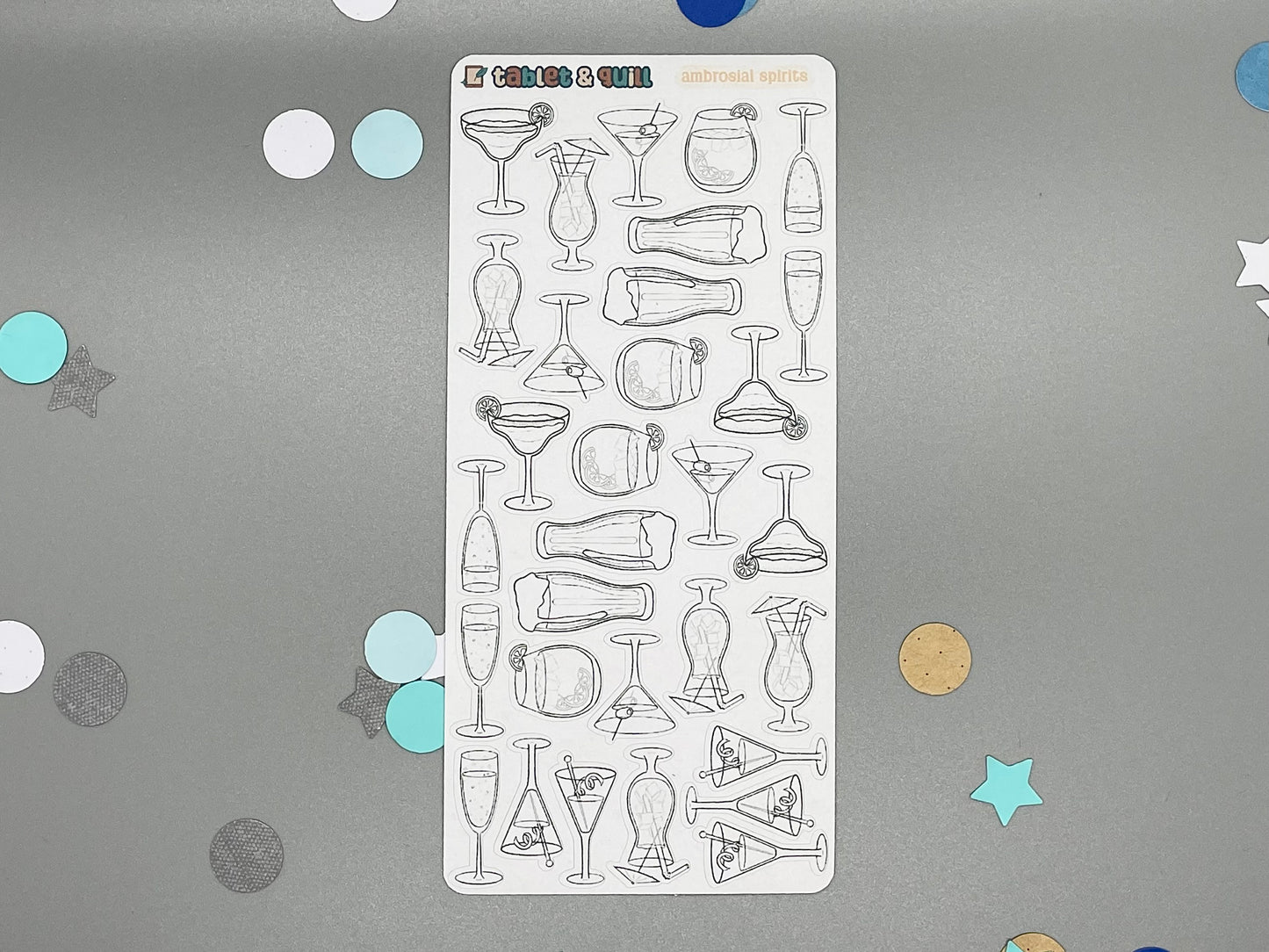 Sticker sheet of diy color drink-themed stickers on a gray background with confetti.