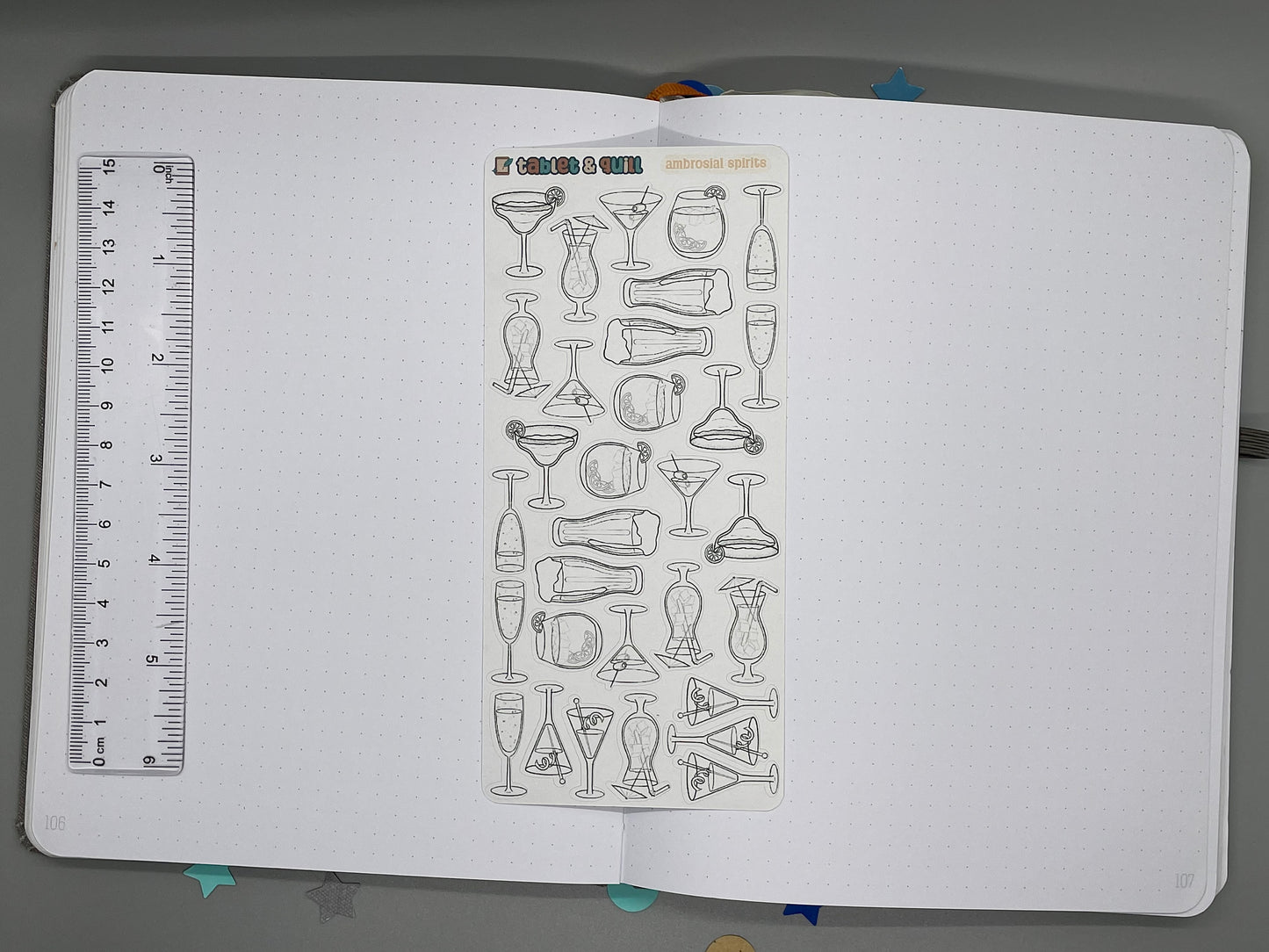 Tropical drinks themed diy color sticker sheet on an open bullet journal with a ruler for scale.