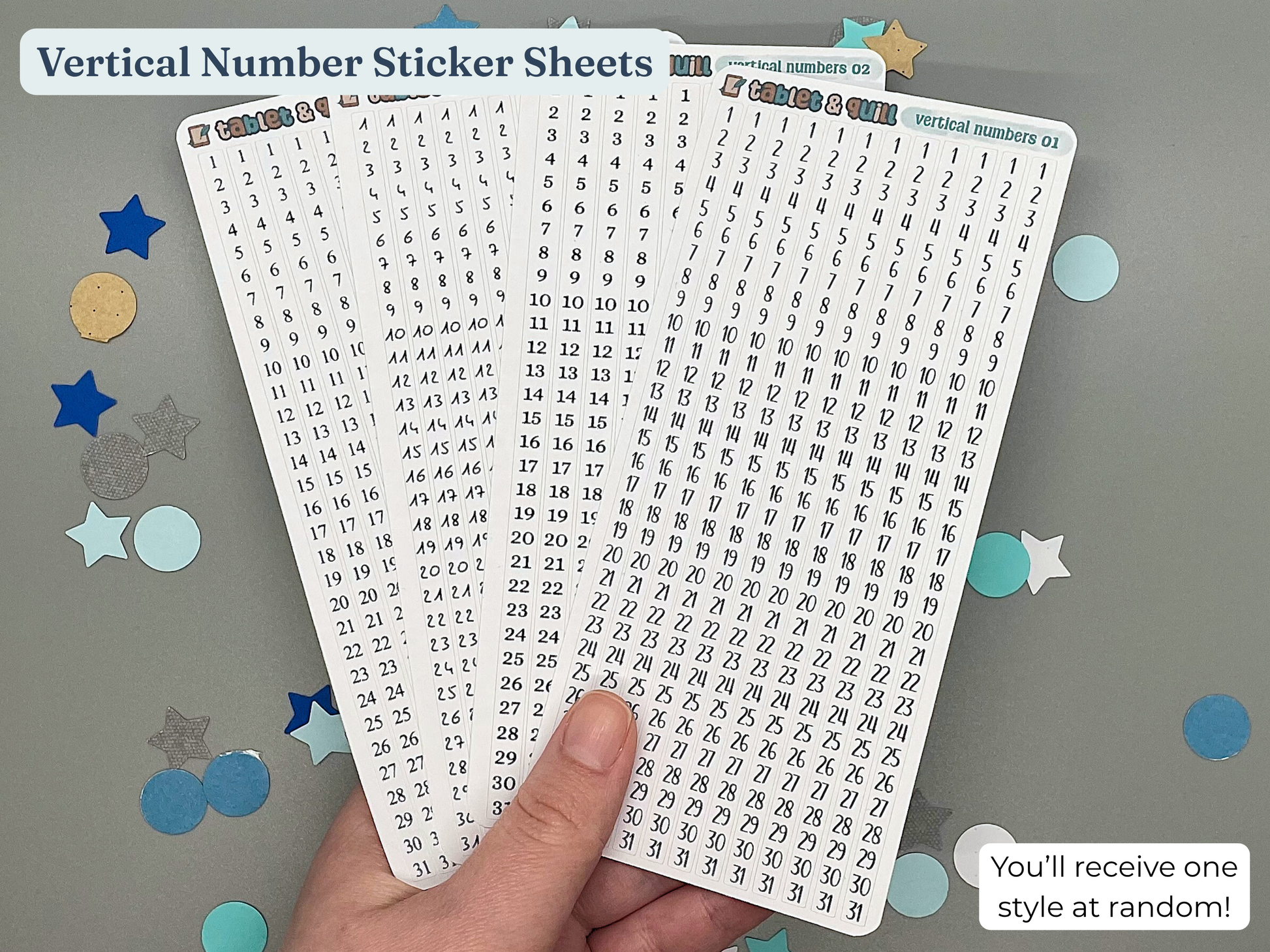 Hand holding a sheet of vertical number stickers with confetti on a gray background
