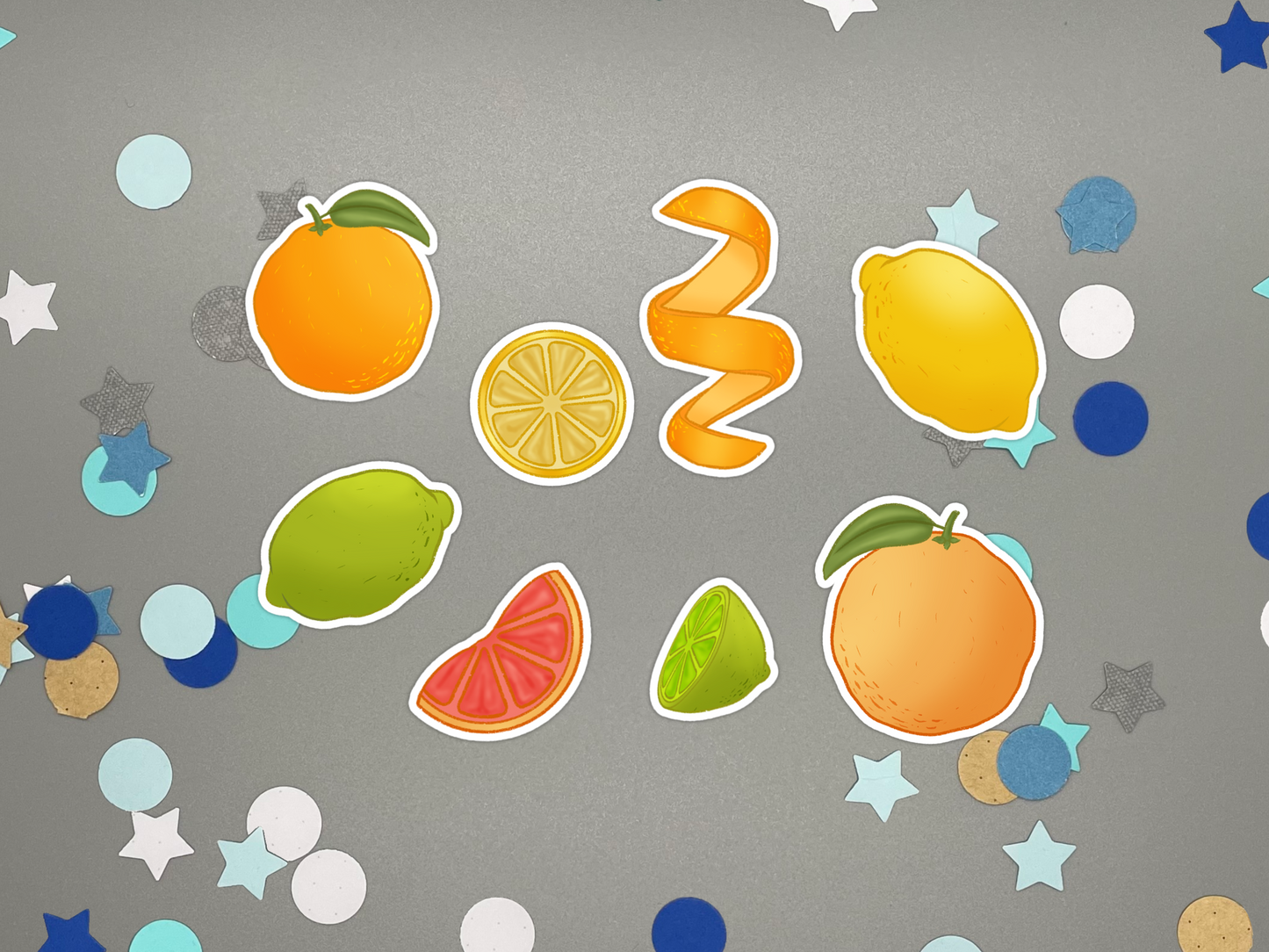 Set of colorful citrus themed bullet journal stickers on a gray background with decorative elements.