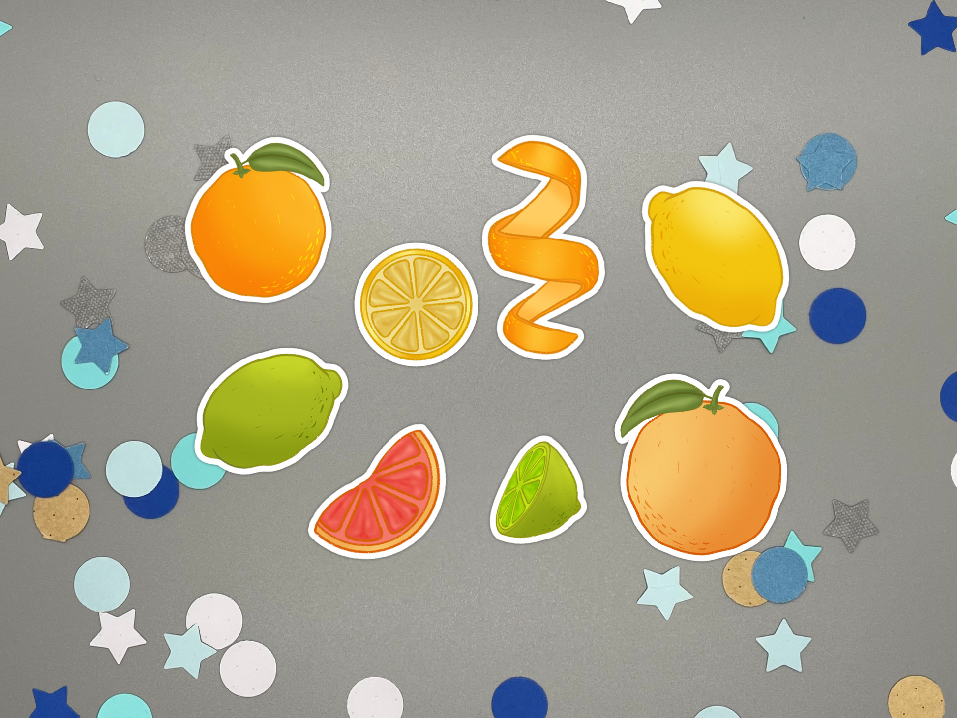 Set of colorful citrus themed bullet journal stickers on a gray background with decorative elements.