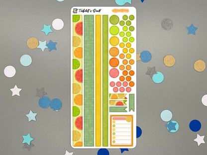 Colorful citrus themed decorative bullet journal stickers on a gray background with decorative elements.