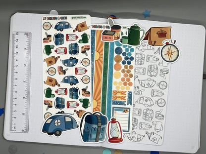 An overview image of camping themed stickers, including a color sticker sheet, a colorable sticker sheet, a decorative sticker sheet, and die cut sticker flakes. Ruler on the left. 