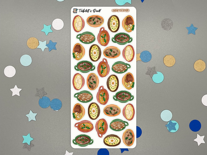 A sheet of decorative stickers featuring illustrated bowls of soup, displayed on a gray background with scattered pastel star and circle confetti.
