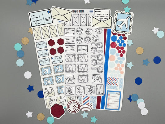 Set of mail themed stickers for bullet journals and planners. Set includes colorable sticker sheet, decorative sticker sheet, color sticker sheet, and die cut sticker flakes.