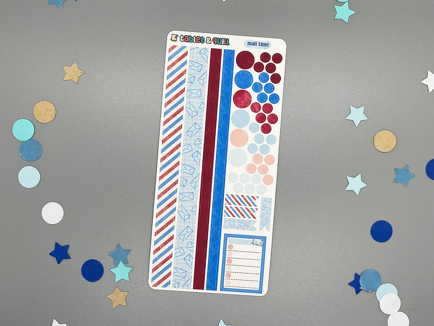 Sticker sheet with matching design as our mail themed stickers on a gray background with decorative stars and circles.