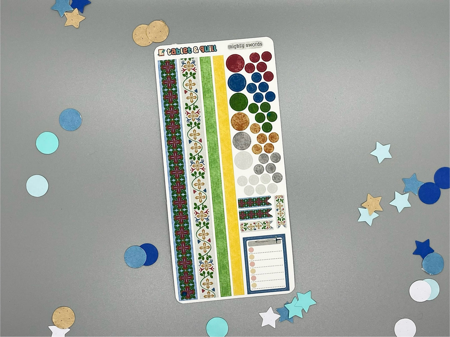 Colorful sticker sheet with decorative elements on a gray background