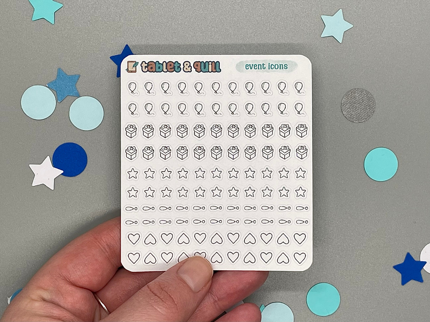 Sheet of event icons held by a hand with decorative confetti on a gray background