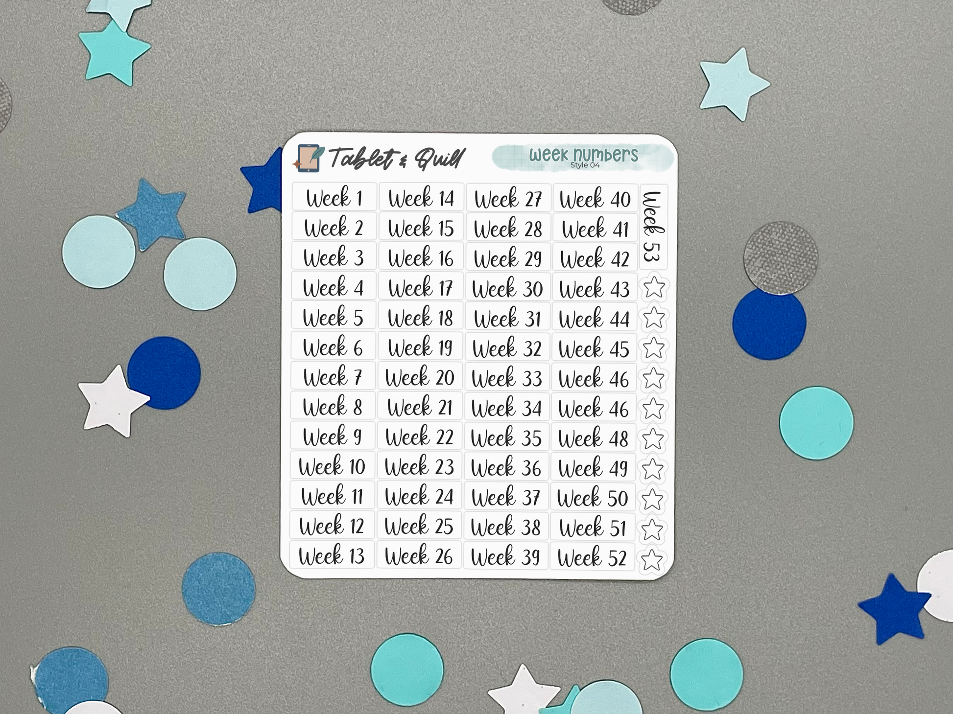 Planner sticker sheet with week numbers on a gray background with decorative stickers.