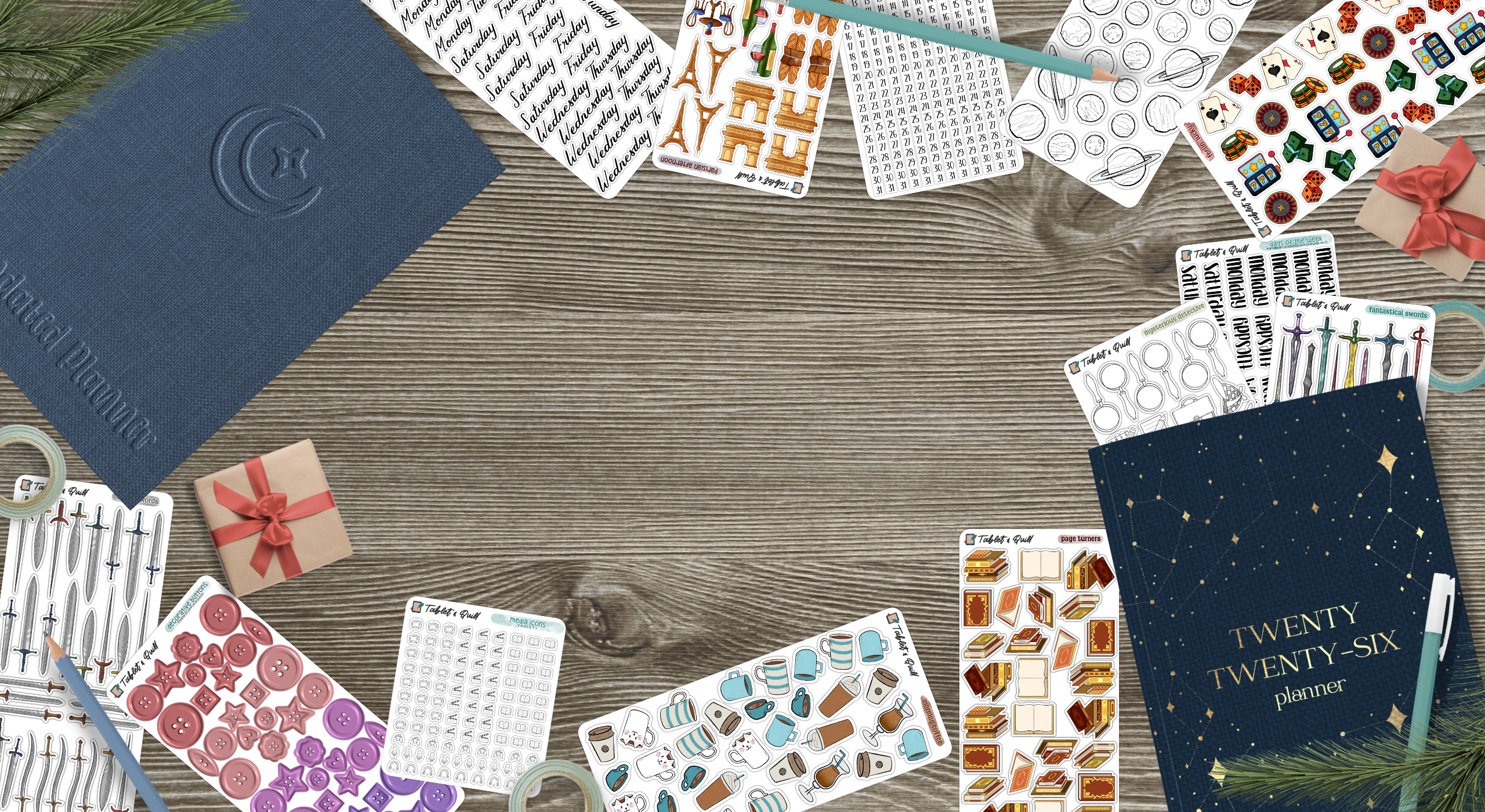 Collection of bullet journal stickers and planners on a wooden surface.