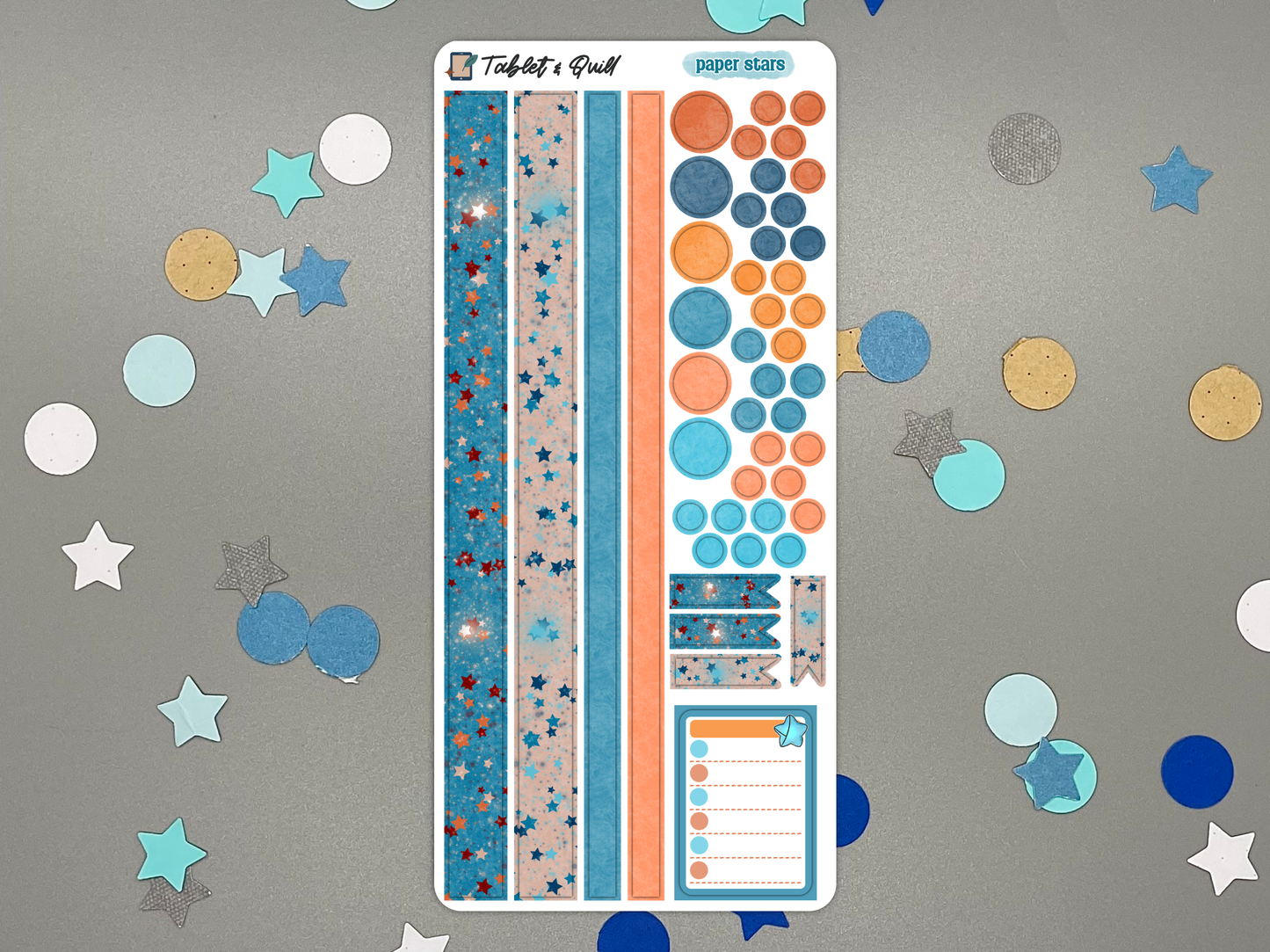 Decorative paper stars themed sticker sheet on a gray background with confetti.