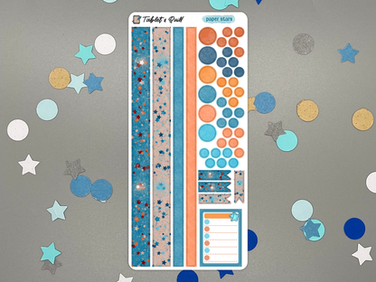 Decorative paper stars themed sticker sheet on a gray background with confetti.