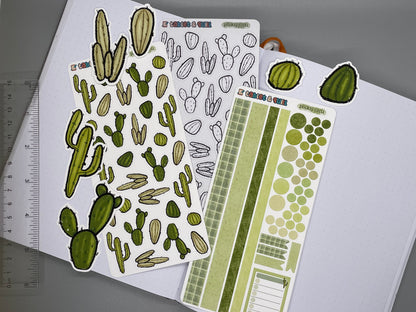 An overview image of cacti themed stickers, including a color sticker sheet, a colorable sticker sheet, a decorative sticker sheet, and die cut sticker flakes. Ruler on the left. 