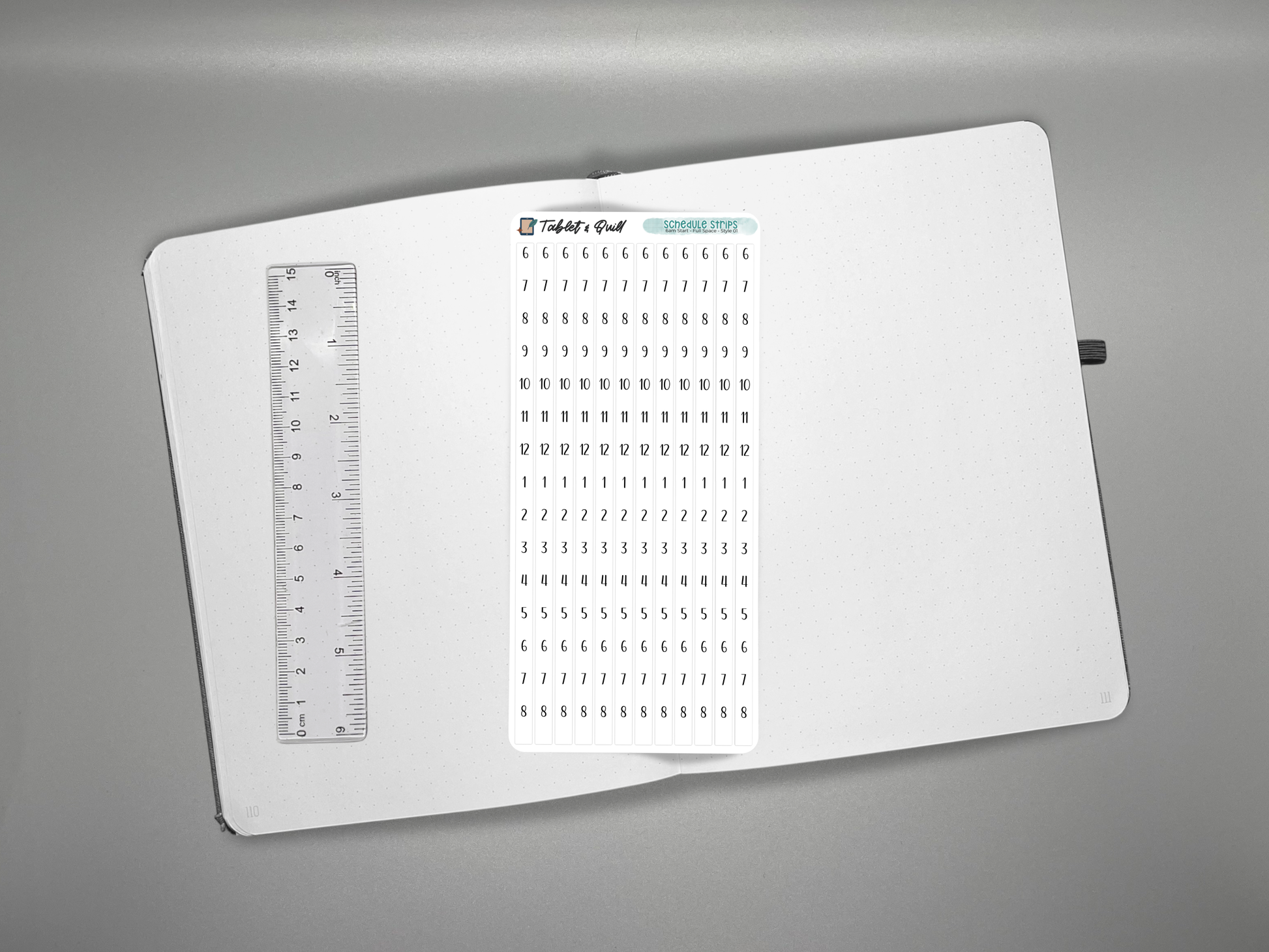 Schedule time blocking sticker sheet on a journal with a ruler for scale over a gray background.
