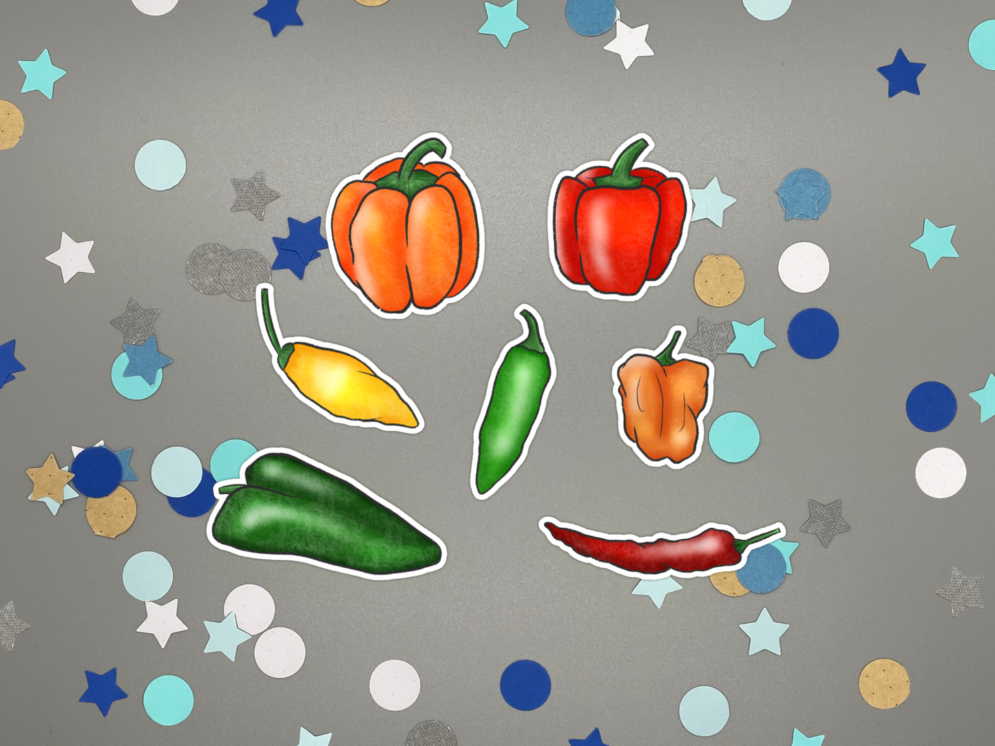 Colorful pepper stickers on a gray background
