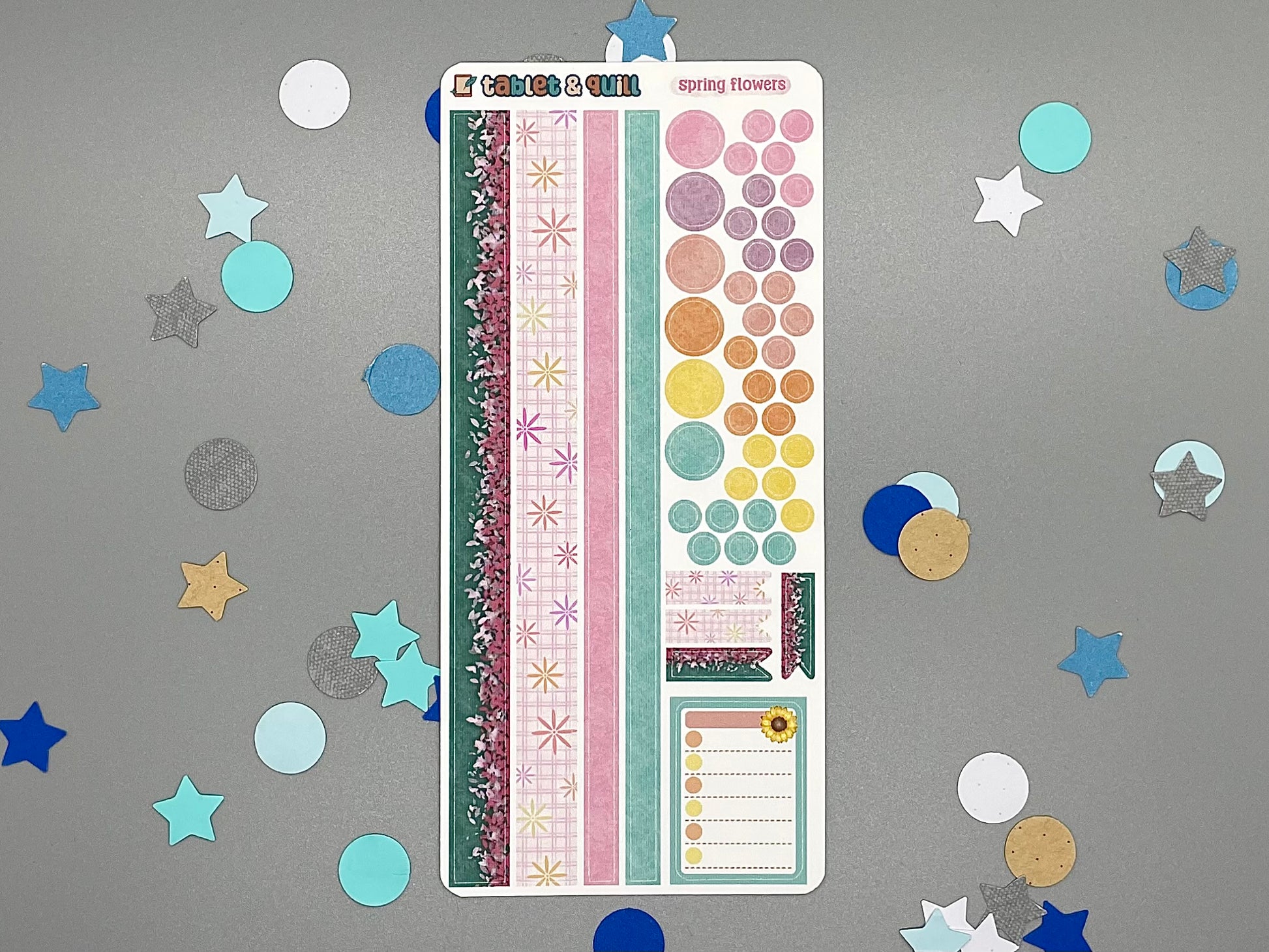 Decorative spring flowers themed sticker sheet on a gray background with confetti.