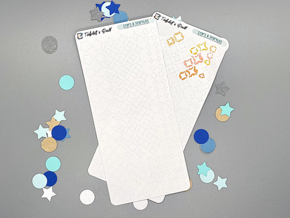 Two stars and sparkles sticker sheets on a gray background. One sticker sheet has some stars removed.