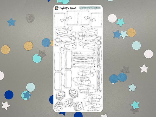 Stationery themed DIY color bullet journal sticker sheet on a gray background with confetti.