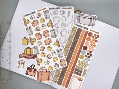 Set of vintage luggage themed stickers for bullet journals and planners. Set includes colorable sticker sheet, decorative sticker sheet, color sticker sheet, and die cut sticker flakes. Ruler for scale on the left. 