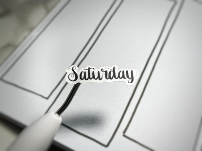 Closeup of weekdays sticker style 01 in a script style.