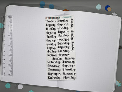 Sticker sheet of weekdays lettering in a script style. Named weekdays 01. Ruler for scale on left.
