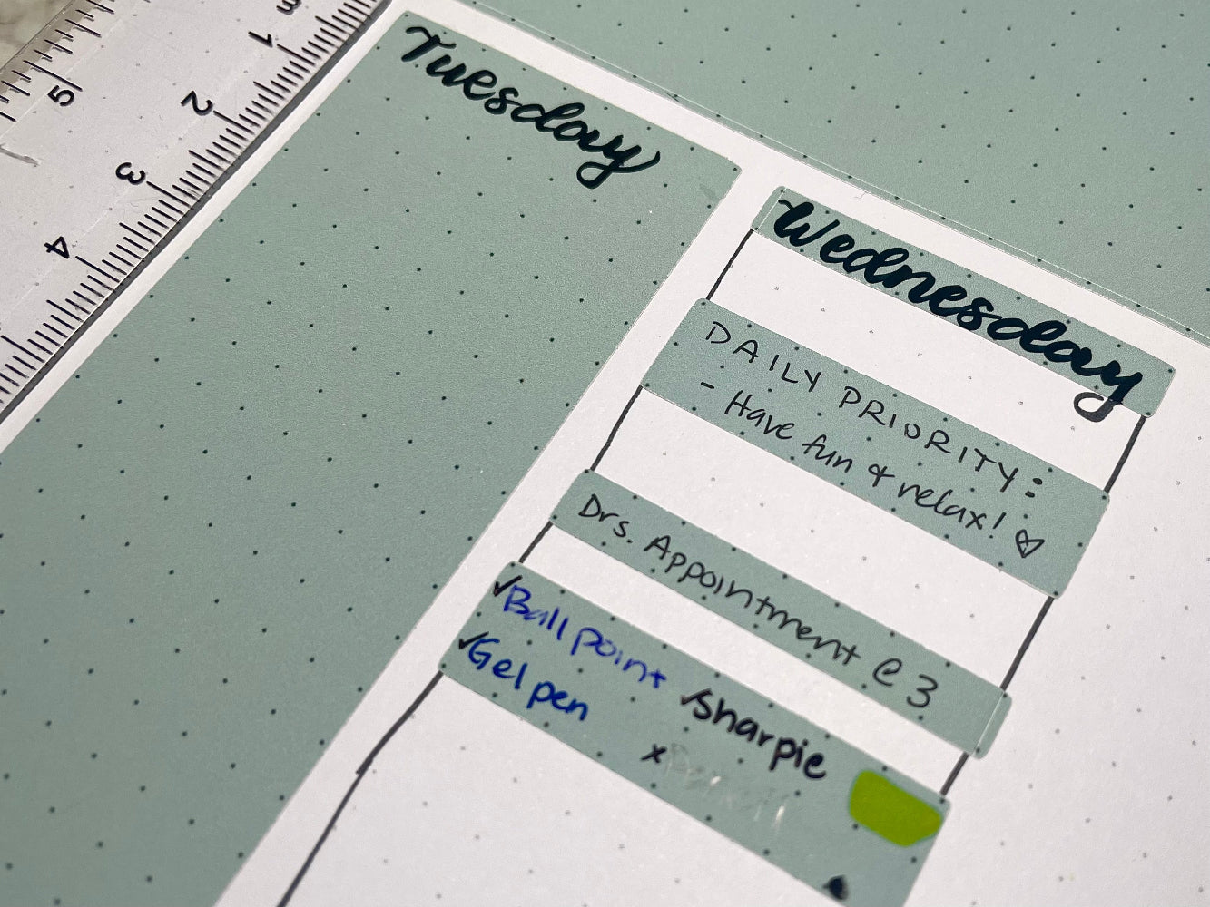 Weekly planner stickers with text on a grid background