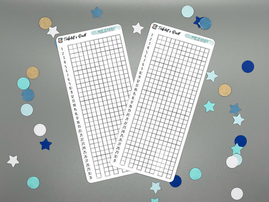 Two year in pixels with vertical number strip sticker sheets on a gray background with colorful stars and circles.